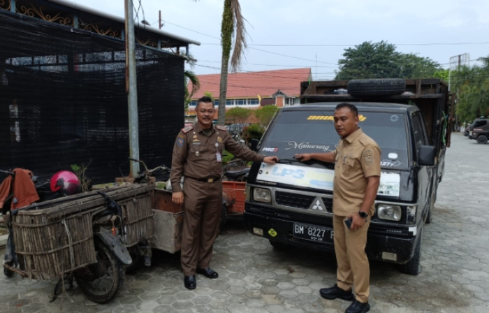 Buang Sampah Sembarangan, DLHK Pekanbaru Kandangkan 8 Angkutan Mandiri