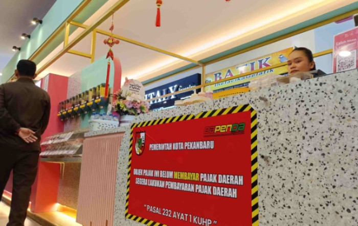 Juru Sita Bapenda Pekanbaru Lakukan Penagihan Aktif ke Penunggak Pajak