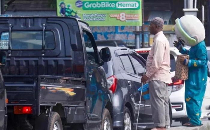 Pemko Pekanbaru Himbau Warga tak Beri Sumbangan di Pinggir Jalan