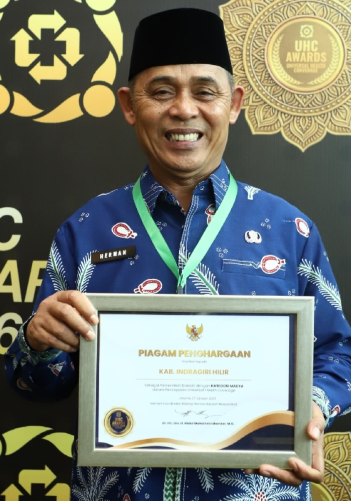 Bupati Inhil Terima UHC Awards 2026, Cakupan Jaminan Kesehatan Tembus 98 Persen